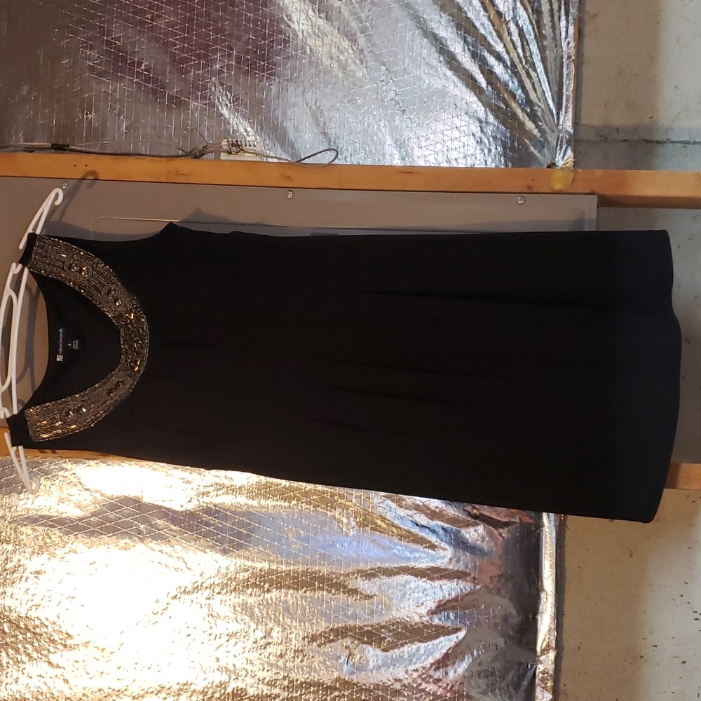 Valerie Bertinelli black dress sequins around knock line